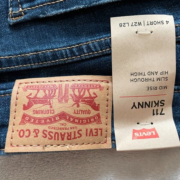 NEW. Women's Size 4 short, Levi's 711,  Distressed, Dark Wash, Hypersoft jeans. - Picture 4 of 15